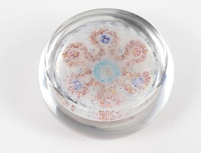 BACCARAT Paperweight ball in colorless crystal with inclusions of polychrome millefiori...