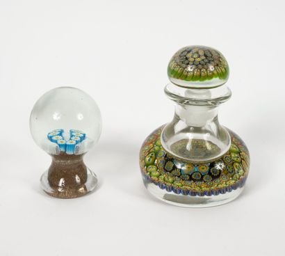 null Two pieces in glass or colorless crystal:

- Paperweight ball of two lines of...