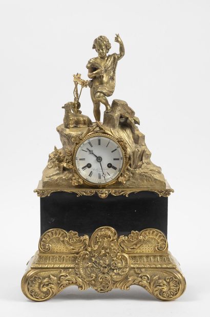 null Clock in bronze and gilt brass and black marble decorated with Saint John the...