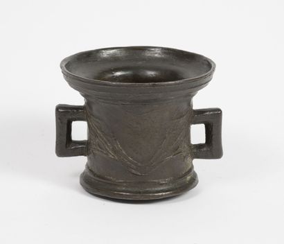 null Mortar of pharmacy in bronze with brown patina, flared neck, molded body with...