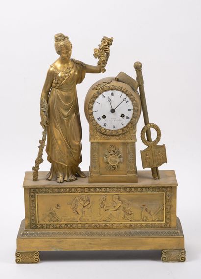 Gilded bronze and brass clock decorated on...