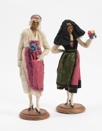 LAFITTE DESIRAT 1918 Two wax mannequin dolls:

- Folkloric of Alsatian spirit holding...