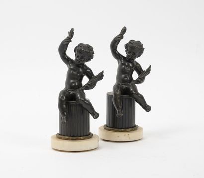 null Pair of putti sitting on a half-column and holding attributes.

Proofs in black...
