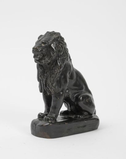 D'après Antoine Louis BARYE (1796-1875) Seated lion n°4.

Proof in bronze with black...