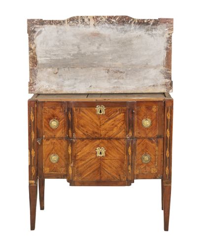 null Small chest of drawers with a central recess in exotic wood veneer and filleted...