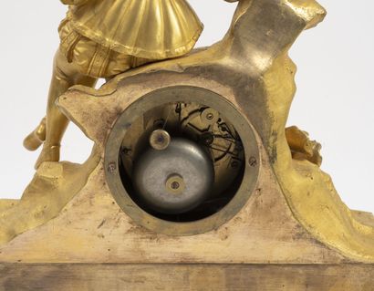 null Romantic period clock in bronze and gilt brass.

Decorated with a man in Renaissance...