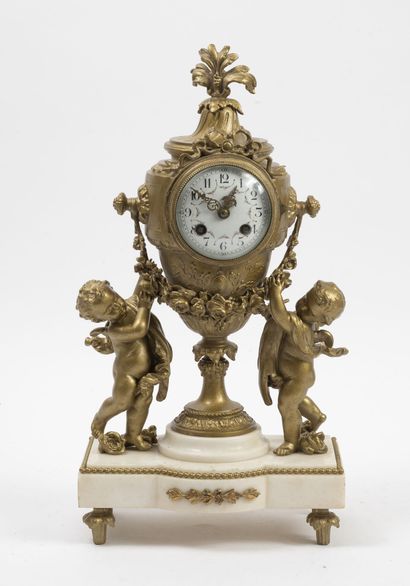 
Louis XVI style clock in bronze and gilt...