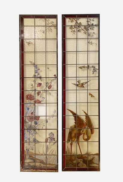 null Pair of window casements trimmed with stained glass painted with a bird, butterflies...