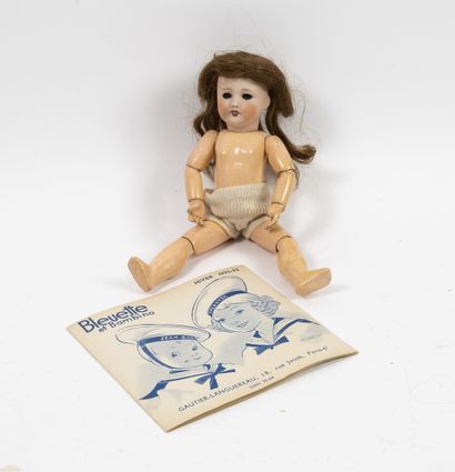 UNIS FRANCE, Bleuette Porcelain head doll with open mouth over teeth, blue sleeping...