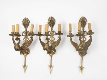 Suite of three ormolu sconces with swan decoration...