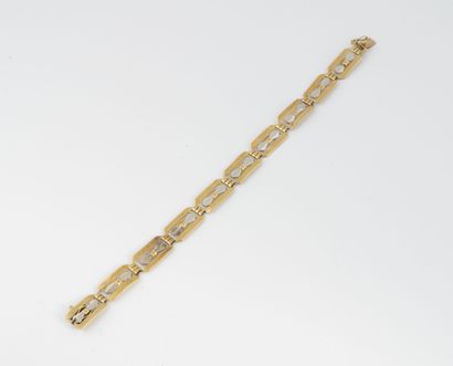 Bracelet en or jaune et gris (750) à maillons...