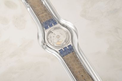 SWATCH N° 08079 Vers 1993 
Montre bracelet.




Boîtier rond en platine (950). 




Cadran...