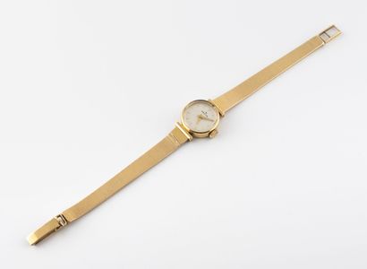 ZENITH Lady's wristwatch in yellow gold (750).
Round case. 
Iridescent white dial,...