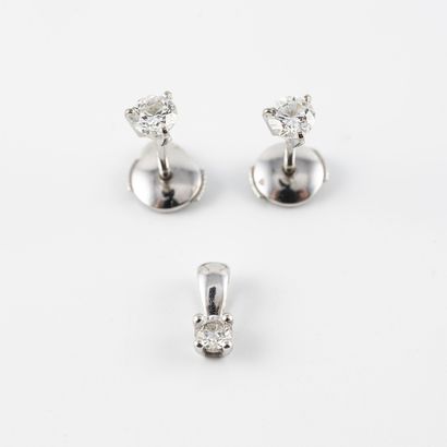 Pair of white gold (750) ear studs set with...