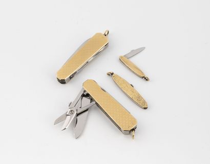 Four small stainless steel penknives with...