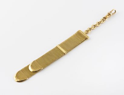 null Chain with mesh forçat and ribbon of watch of gousset in yellow gold (750).
Net...