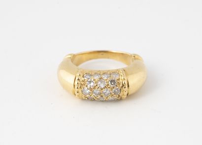 Yellow gold (750) ring centered with a small...