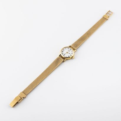 null Montre bracelet de dame en or jaune (750). 
Boîtier rond.
Cadran émaillé blanc,...