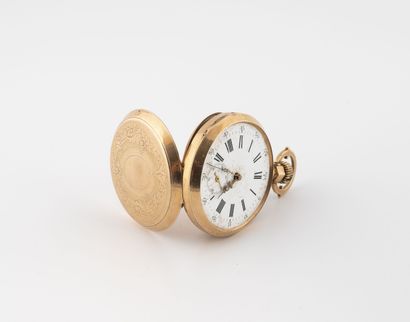 null Pocket watch in yellow gold (750).
Back cover decorated with a medallion in...