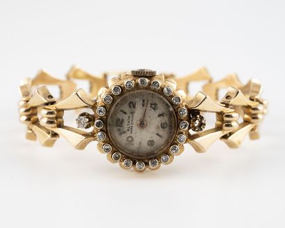 ALTAIR Yellow gold (750) lady's bracelet.
Round case. 
Dial with cream background,...