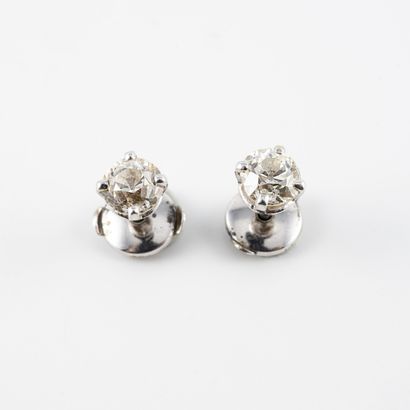Pair of white gold (750) ear studs set with...