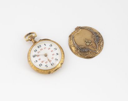 null Yellow gold collar watch (750).
Back cover decorated with scrolls and punctuated...