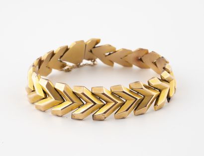Yellow gold bracelet (750) with articulated...