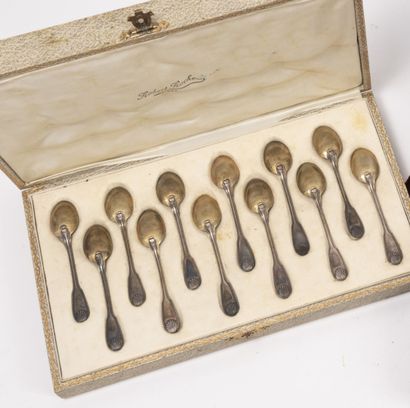 Louis GOIGNET Twelve silver coffee spoons (950) white and gilded, model with nets...