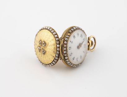 null Yellow gold (750) collar watch. 
Case decorated with half-pearls and back cover...