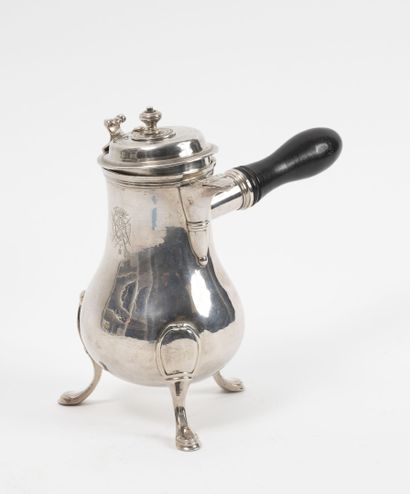 null Small tripod silver chocolate pot (950) with a plain baluster body, a molded...