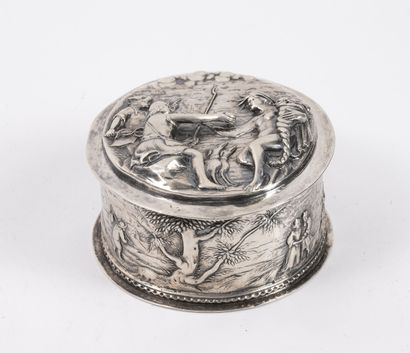 null Circular silver box (min. 800) worked with repoussé, with rotating decoration...