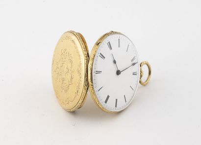null Pocket watch in yellow gold (750).
Back cover with chiseled decoration of Greek...