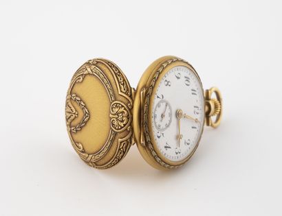 null Yellow gold collar watch (750). 
Back cover with repoussé decoration of laurels....