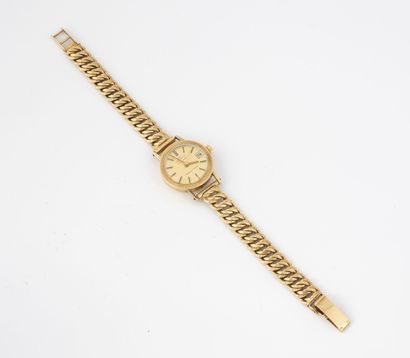 HELVETIA Montre bracelet dame en or jaune (750).
Boîtier rond.
Cadran à fond doré,...