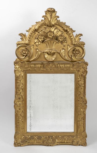 null Rectangular mirror in gilded and carved wood decorated with foliage scrolls,...