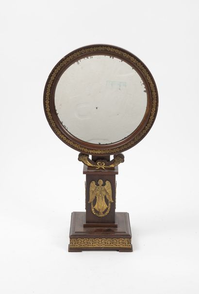 Table mirror of circular form on foot of...