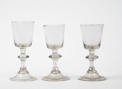 Lot of three leg glasses with button in blown...