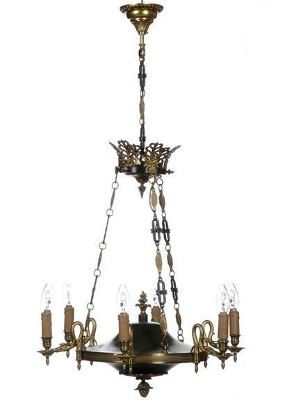 null Chandelier with six lights.
In patinated and gilded metal, with swan neck arms,...