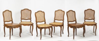 null Suite of 6 chairs in molded beech with caned back and seats, resting on four...