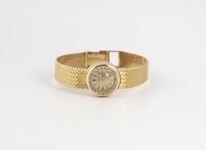 MOVADO Montre bracelet de dame en or jaune (750).
Mouvement mécanique à remontage...