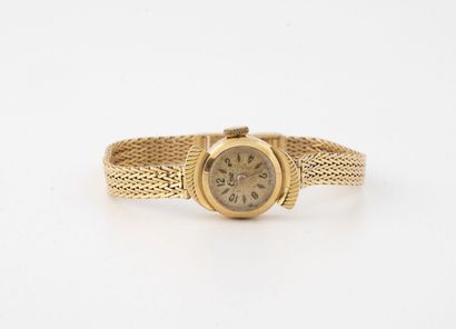 null Small bracelet watch of lady in gold 750 thousandths, dial stained with Arabic...