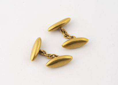 null Pair of yellow gold (750) cufflinks with a navette shape. 
Total weight : 6.4...
