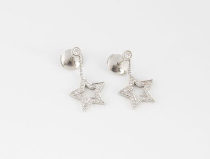 TIFFANY & Co, Star Pair of earrings in platinum (950) holding at the end of a chain...