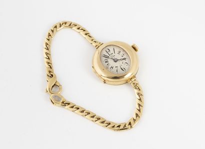 LIP Yellow gold (750) lady's watch with oval case and flat gourmette link bracelet...