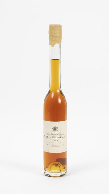 LA FONTAINE DE COINCY Bas-Armagnac.
1 bouteille 35 cl, 1947.
Bon niveau.
Petites...