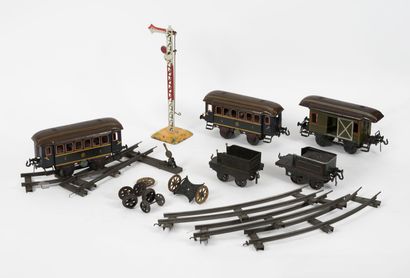 BING Steam locomotive with a tender and three sheet metal cars.
Gauge I.
Three sheet...