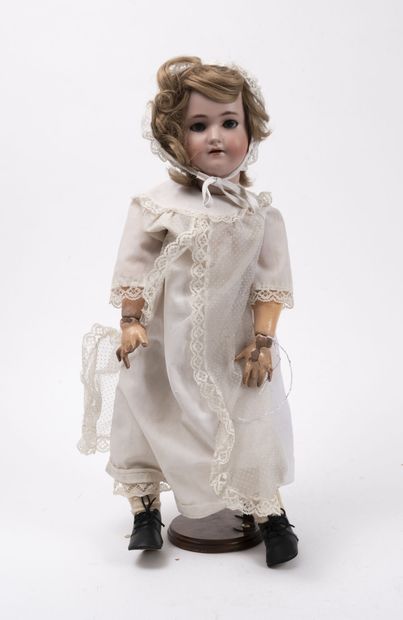SCHOENAU & HOFFMEISTER Porcelain doll with blocked sleeping eyes, open mouth, marked...