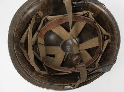 FRANCE Lot of two steel helmets, model 1951.
With liner and chinstraps.
One with...