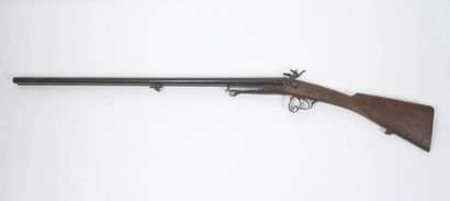 FRANCE, vers 1840-1850 Shotgun with pin.
Engraved back plates of rinceaux.
Barrels...