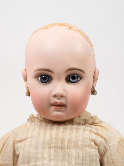 JUMEAU Doll, porcelain head, closed mouth, fixed blue eyes, marked in the back of...